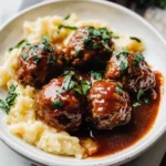 Photo of featured for Savor the Richness: Braised Meatballs in Red Wine Gravy for Your Next Dinner Party