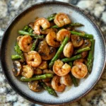 Photo of featured for Savor the Flavor: Quick and Easy Shrimp and Asparagus Stir-fry with Mushrooms