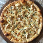 Photo of featured for Savor the Flavor: Irresistible Roasted Garlic White Chicken Pizza Recipe